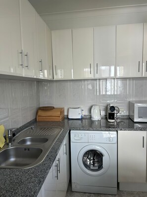 Microwave, oven, stovetop, coffee/tea maker