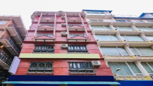 A multi-story building with balconies and large windows. - MeroStay 201 MD HOTEL (Kathmandu)