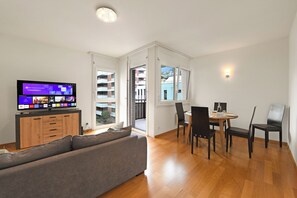 Family Apartment, Multiple Bedrooms (Imbarcadero apartment) | Living area | 21-inch TV with cable channels - Imbarcadero apartment (Locarno)