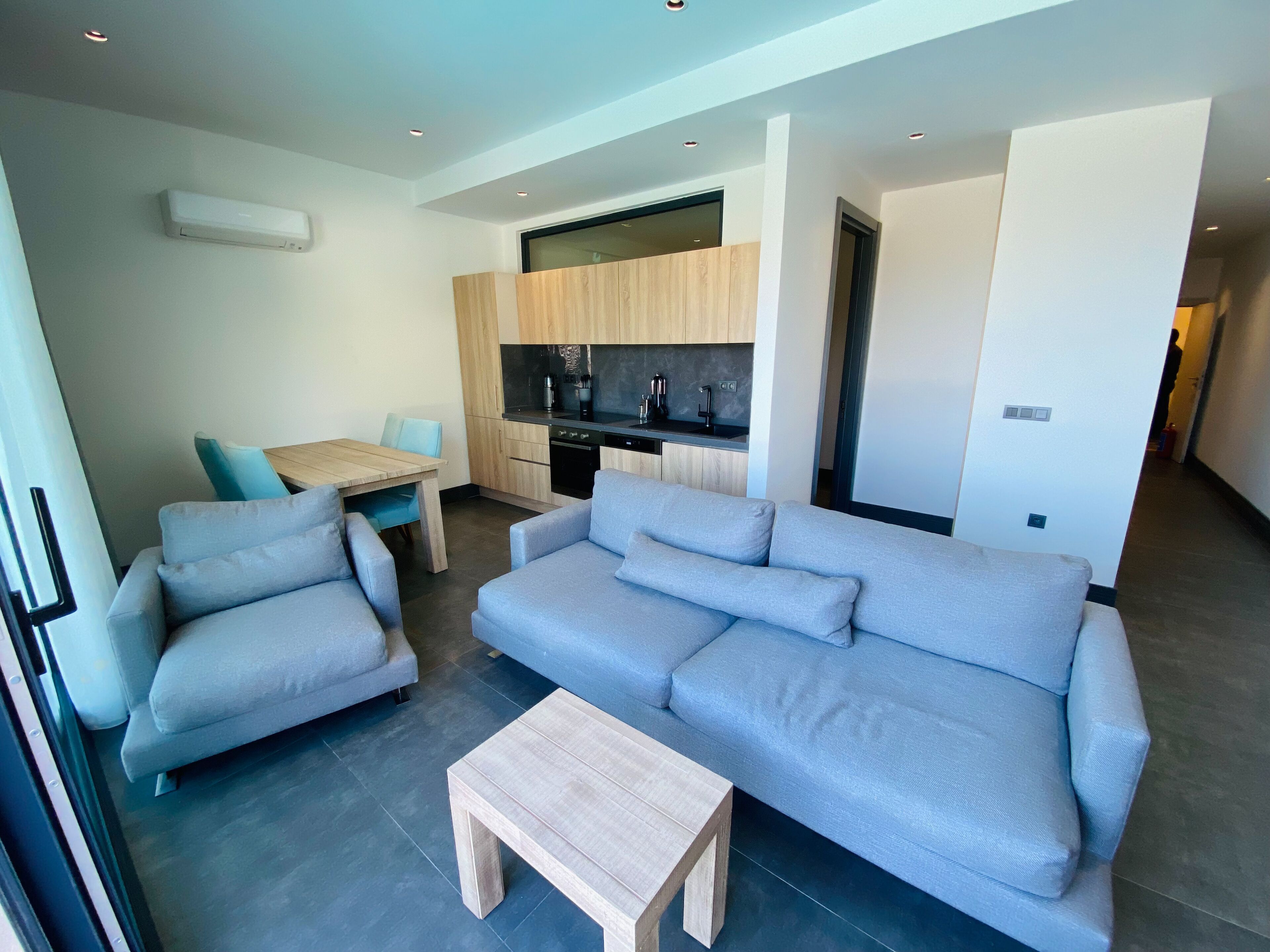 Apartment | Living area | 65-inch Smart TV with satellite channels, TV