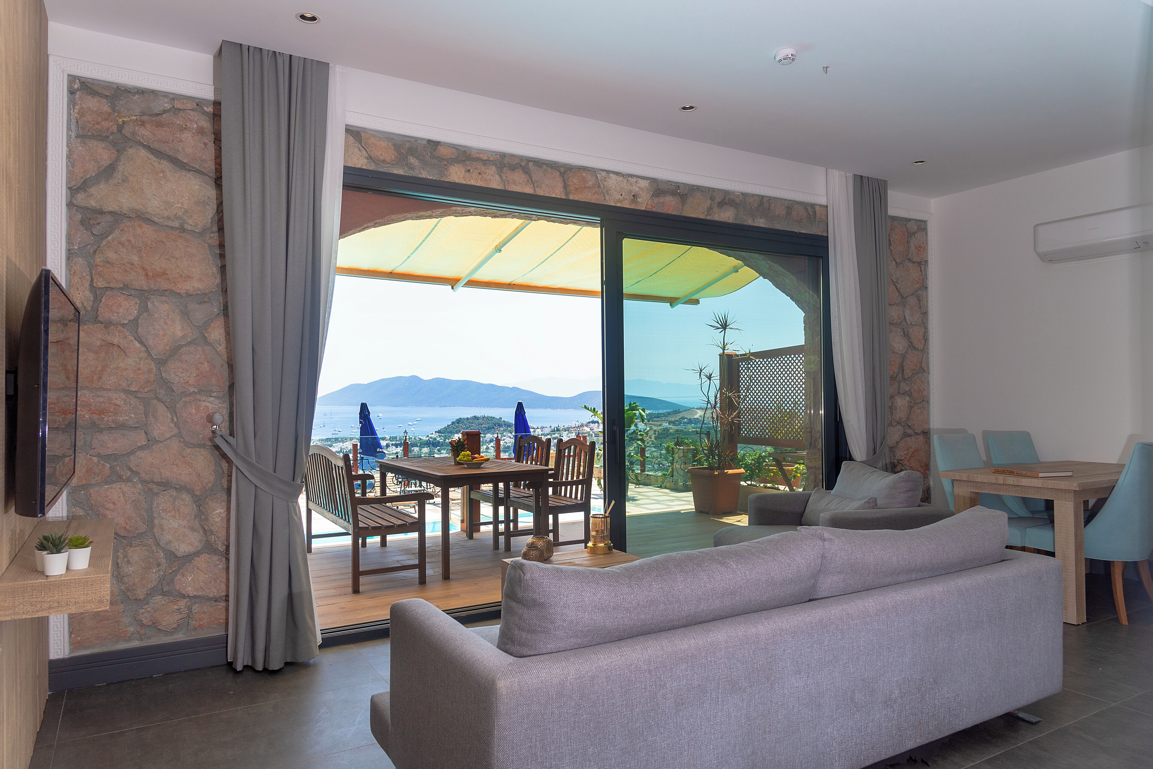 Family Apartment | Living area | 65-inch Smart TV with satellite channels, TV