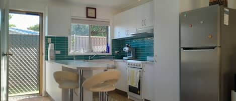 Fridge, microwave, oven, cookware/dishes/utensils