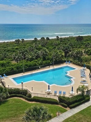 Outdoor pool, a heated pool - Oceanfront 2/2 Condo; Short walk to Pool & Beach! . (Palm Coast)