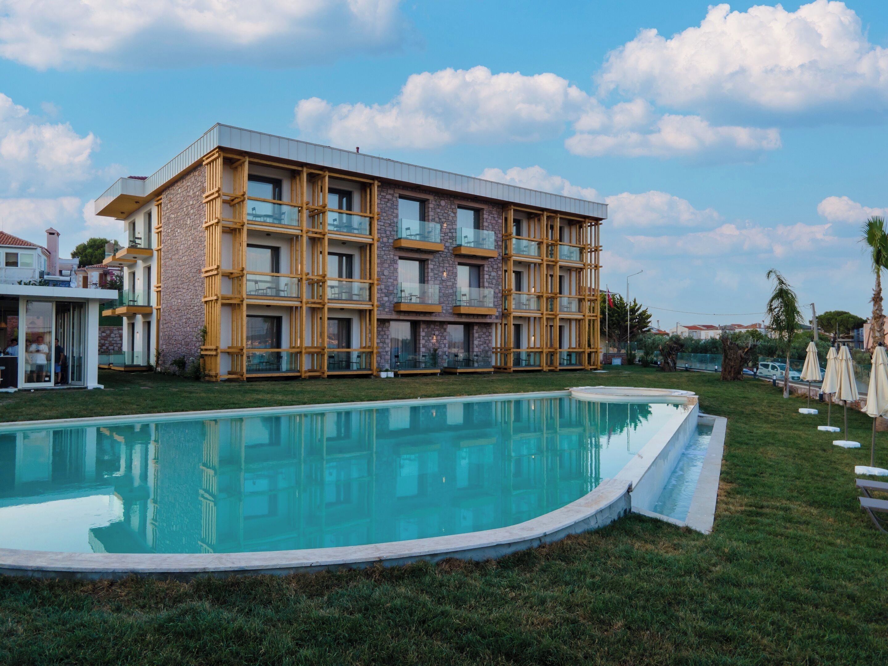 Seasonal outdoor pool, open 8:30 AM to 8:00 PM, pool umbrellas
