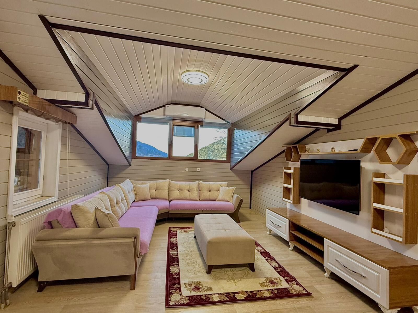 Deluxe Penthouse | Living room | 120-inch Smart TV with satellite channels, TV, heated floors