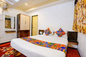 Egyptian cotton sheets, premium bedding, in-room safe, free WiFi - Fabexpress Sai Chatra (Nashik)