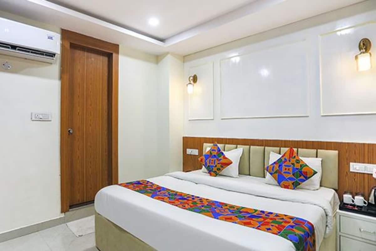 ห้องดีลักซ์ | ผ้าปูที่นอนฝ้ายอียิปต์, เครื่องนอนระดับพรีเมียม, ตู้นิรภัยในห้องพัก