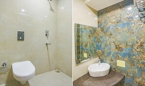 Deluxe Room | Bathroom | Shower, rainfall showerhead, free toiletries, towels