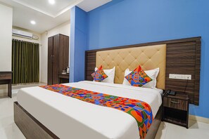 Deluxe kamer | Lakens van Egyptisch katoen, luxe beddengoed, een kluis op de kamer