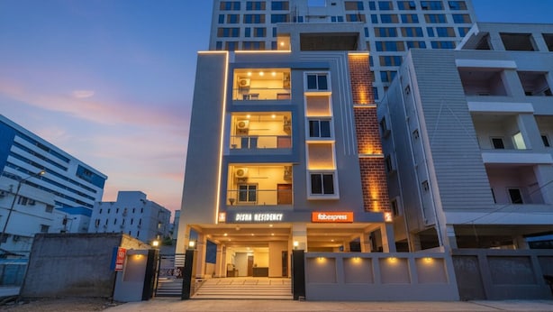 A modern multi-story building with a sign reading "Disha Residency." - FabHotel SR Hitech City (Hyderabad)