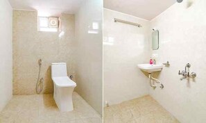 A bathroom with a toilet, a shower, and a sink. - FabHotel SR Hitech City (Hyderabad)