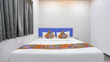 Deluxe kamer | Lakens van Egyptisch katoen, luxe beddengoed, een kluis op de kamer