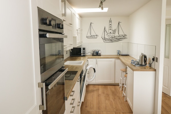Fridge, dishwasher, electric kettle, toaster