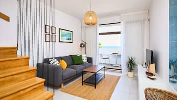 Apartment (1 Bedroom) | Living room | 123-cm TV with cable channels