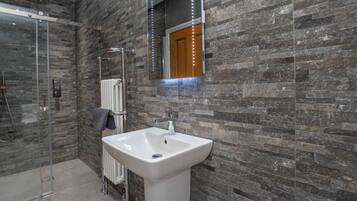 Bathtub, hair dryer, towels