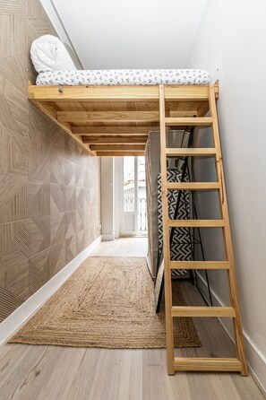 Iron/ironing board, travel crib, free WiFi, bed sheets