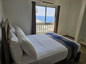 Deluxe Apartment, 2 Bedrooms, Balcony, Sea View | 2 bedrooms, premium bedding, Select Comfort beds, minibar