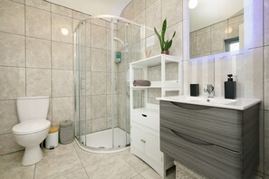 Shower, hair dryer, towels, soap