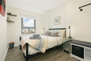 2 bedrooms, iron/ironing board, travel crib, Internet