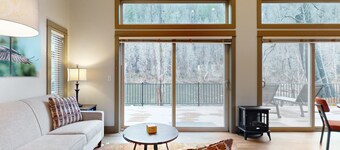 Amazing riverfront cabin with views, deck, firepit, & grill - dog-friendly