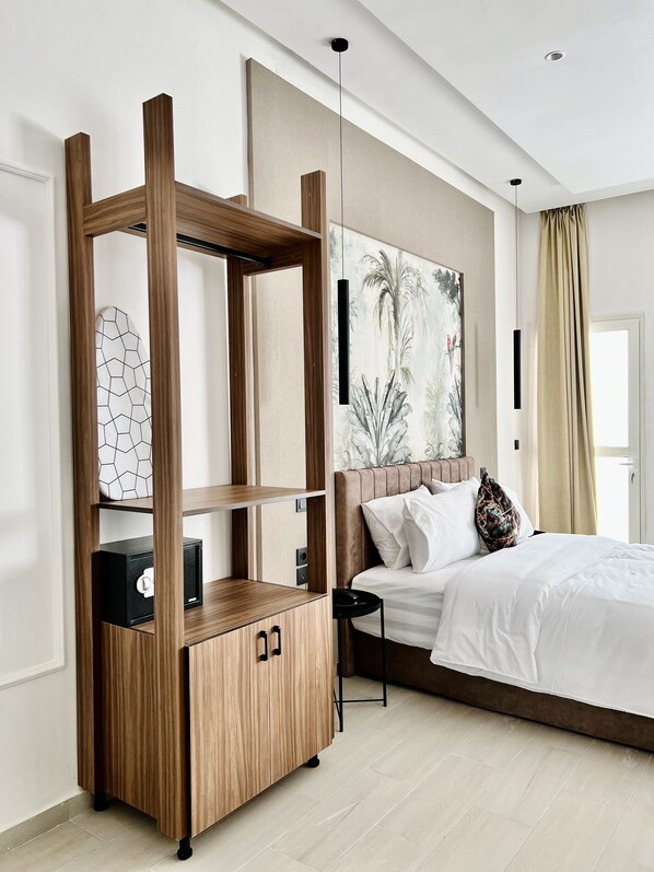 Deluxe loft | Een kluis op de kamer, verduisterende gordijnen, geluiddichte muren