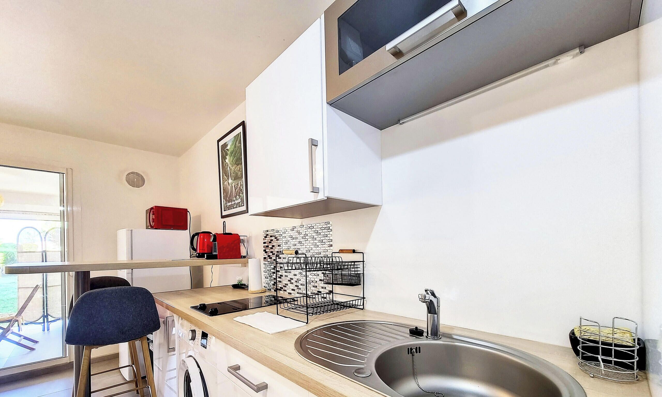 Fridge, microwave, stovetop, coffee/tea maker