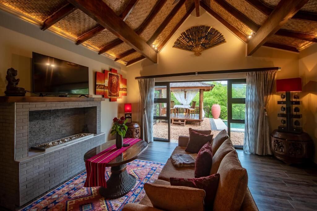 Luxury Villa | Living area | 50-inch LED TV with satellite channels, TV