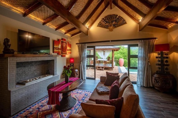 Luxury Villa | Living area | 50-inch LED TV with satellite channels, TV