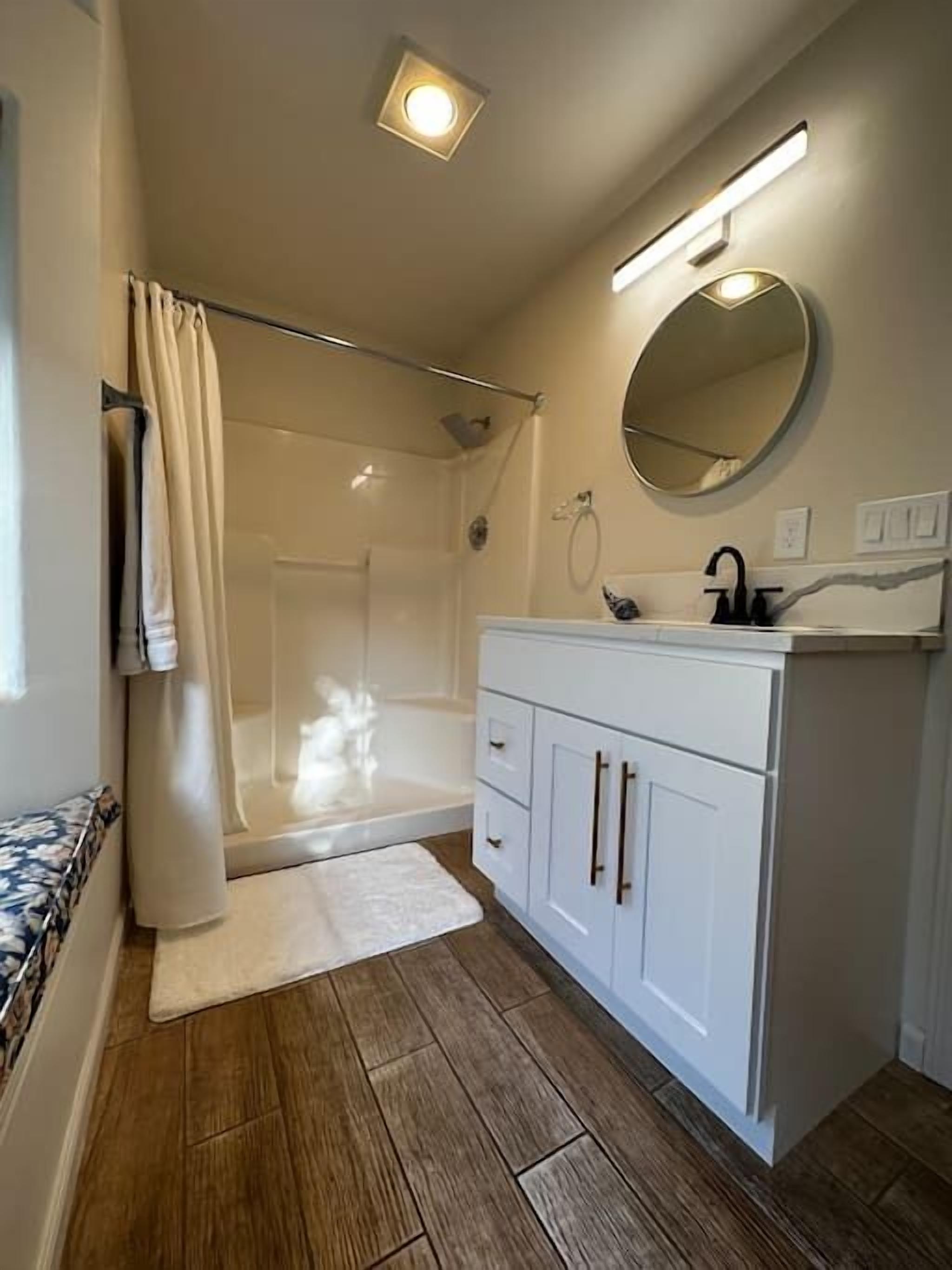 Bathtub, hair dryer, towels