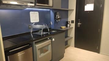 Mini-fridge, microwave, stovetop, electric kettle
