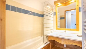 Bathtub, hair dryer