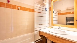 Bathtub, hair dryer