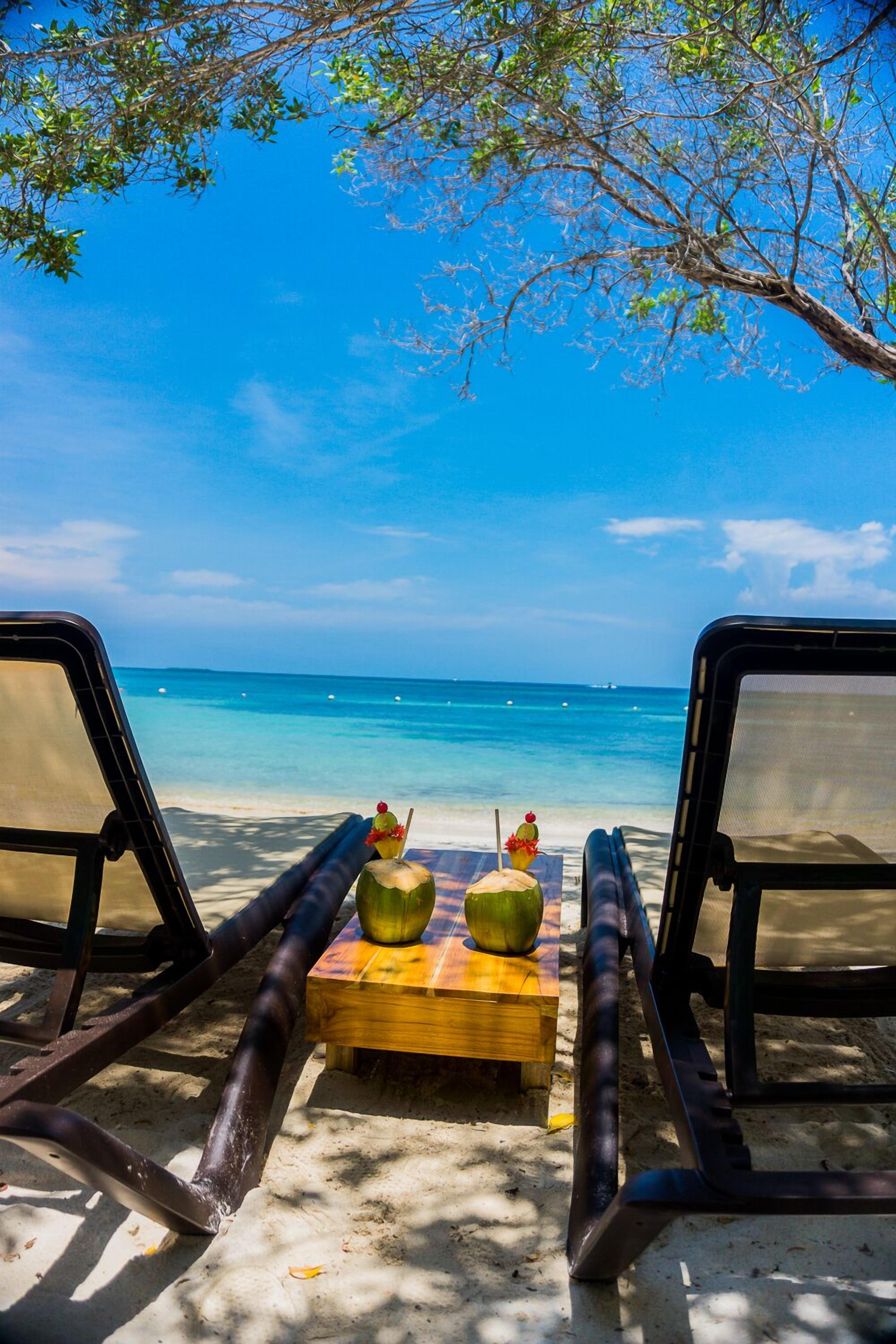On the beach, white sand, beach shuttle, sun loungers