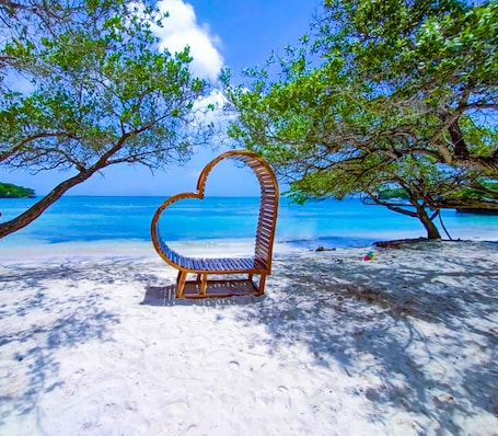 On the beach, white sand, beach shuttle, sun loungers