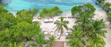 On the beach, white sand, beach shuttle, sun-loungers