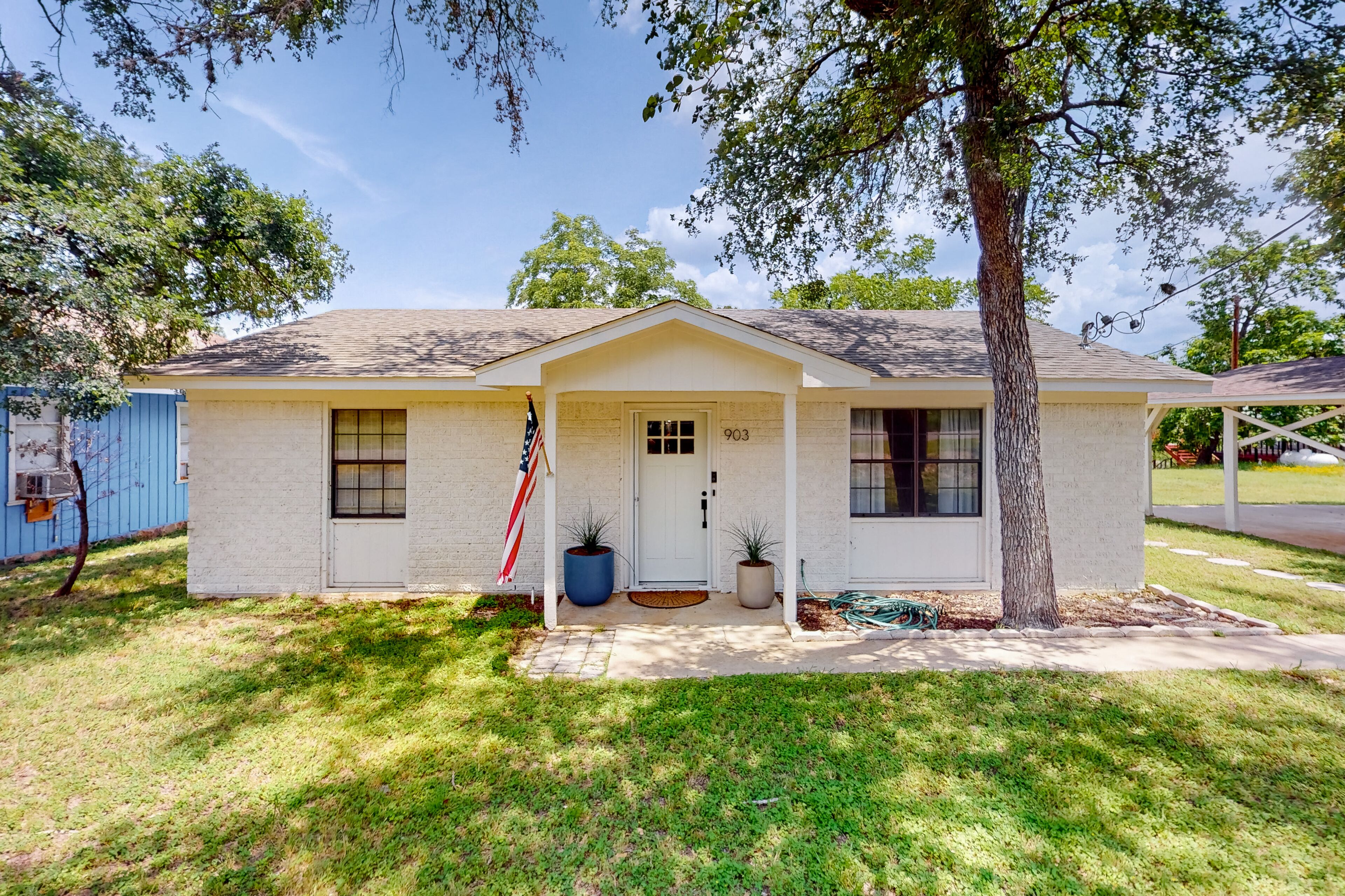 Dog-friendly waterfront home with dock, grill, water views, patio, washer/dryer