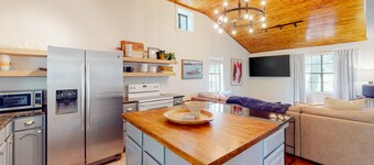 Dog-friendly waterfront home with dock, grill, water views, patio, washer/dryer