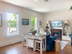 Smart TV, fireplace, books