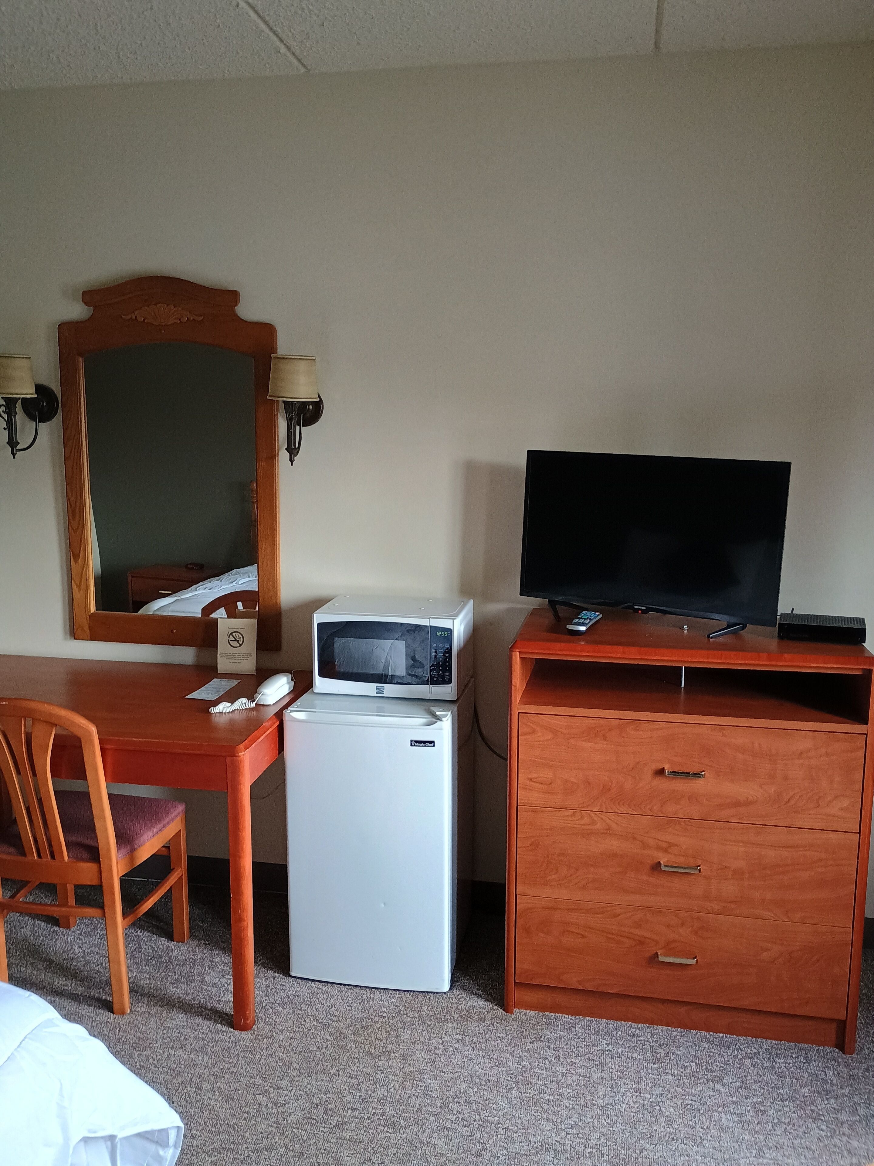 Desk, laptop workspace, blackout curtains, iron/ironing board