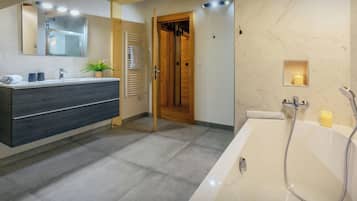 Bathtub, hair dryer, towels