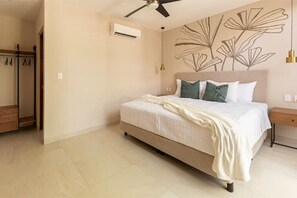 2 habitaciones, tabla de planchar con plancha y cuna de viaje