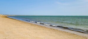 On the beach, sun loungers