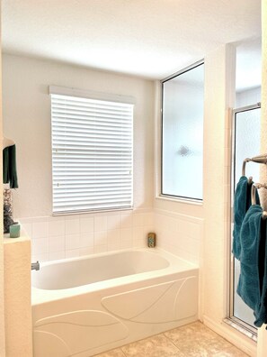 Shower, hair dryer, towels, soap
