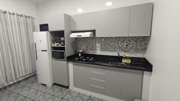 Apartamento 6 | Private kitchen | Fridge, microwave, rice cooker, blender