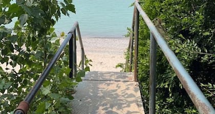 Lake Huron Getaway: Cozy Cottage, Private Access, Second-Row Location