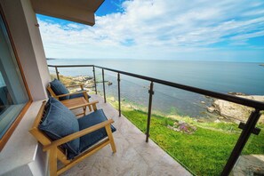 Suite Deluxe, vistas al mar | Terraza o patio