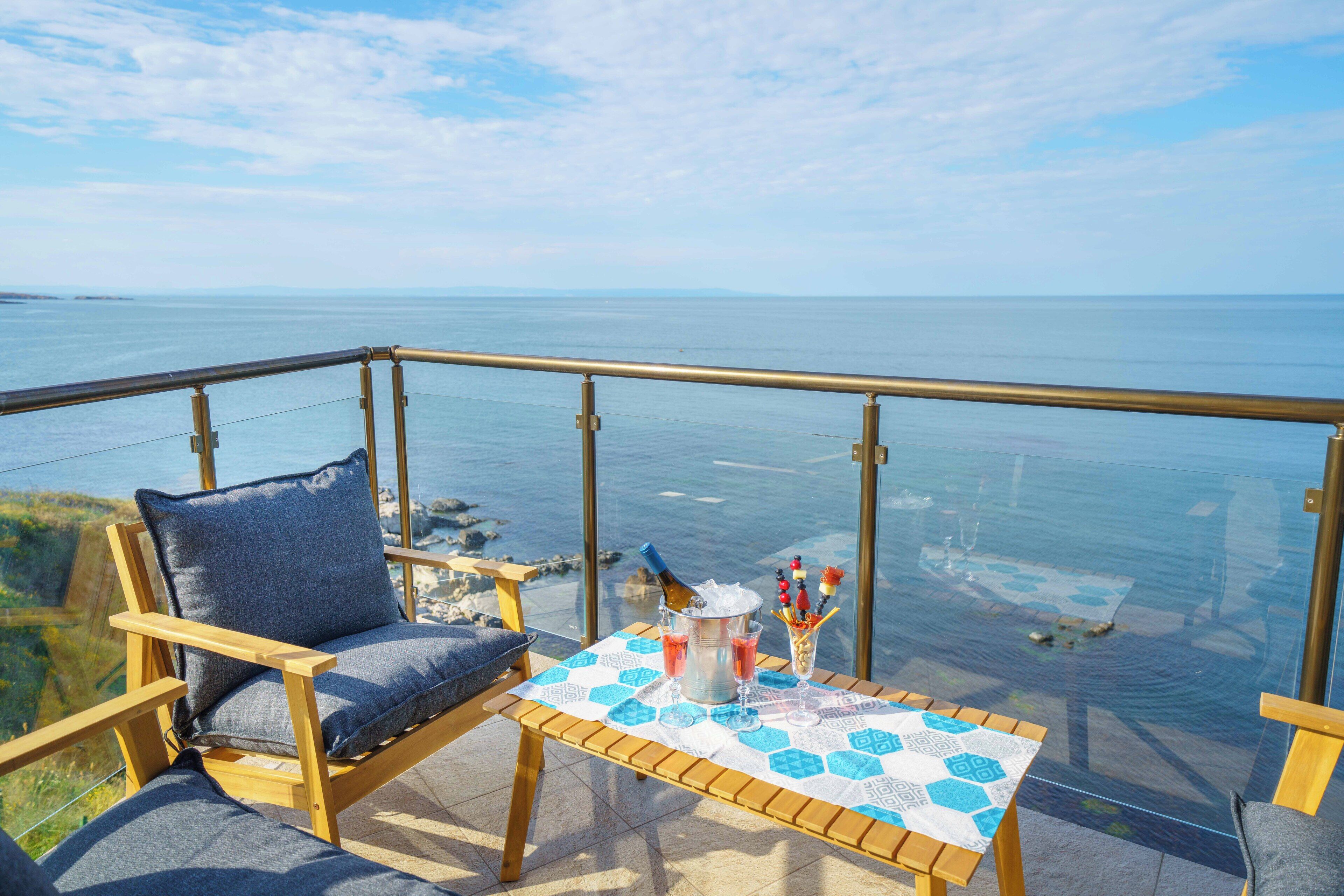 Suite – deluxe, sjøutsikt | Terrasse/patio