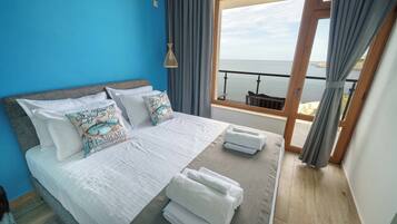 Deluxe Suite, Sea View | 1 bedroom, premium bedding, down duvets, minibar