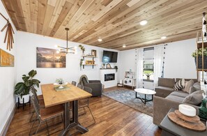 Smart TV, fireplace, books, offices