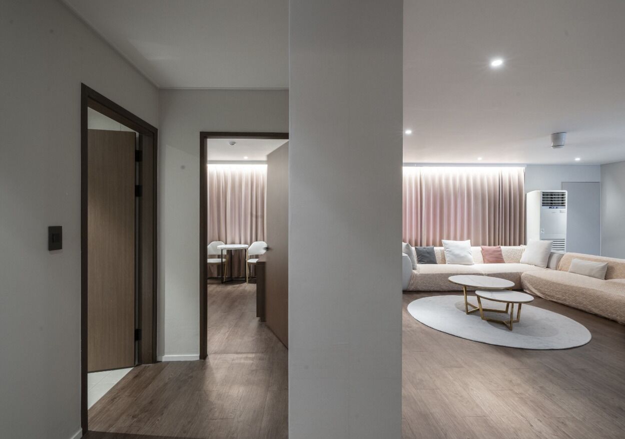 Presidential Suite | Living area | 65-inch flat-screen TV with cable channels